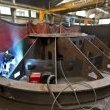Welding operations on a mechano-welded component