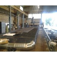 General view of flame-cutting machine with a capacity of cutting metal plates of 12 meters long - CMA Group