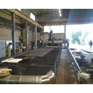 Flame-cutting machine - Flame-cutting machine with downdraft table - CMA Group